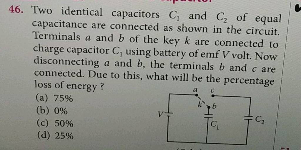 Two identical capacitors C1 and C2 of equal capacitance are connected a..