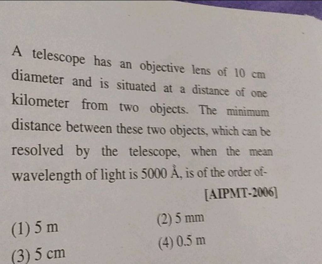 A telescope has an objective lens of 10mathrm cm diameter and is situated..