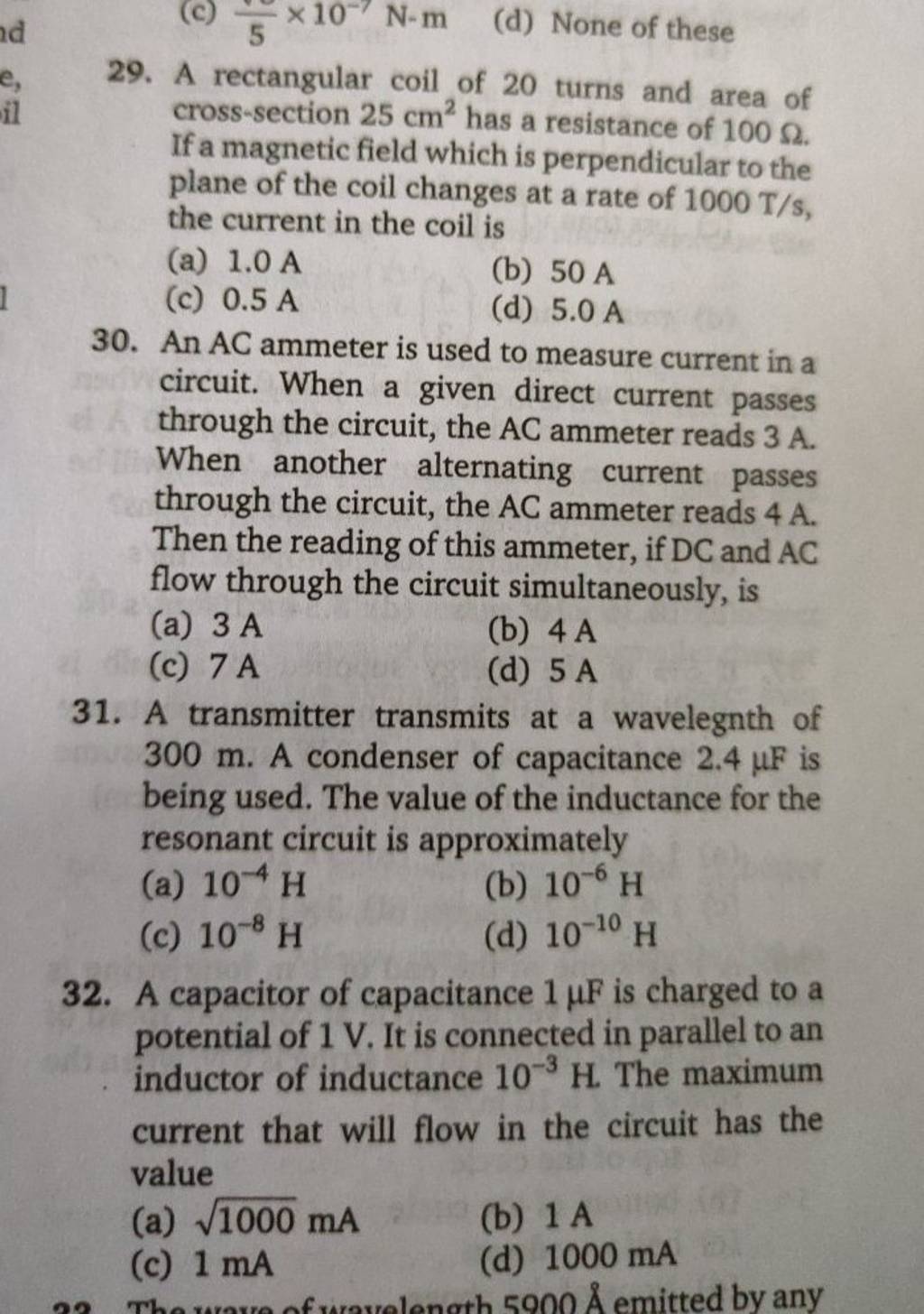A transmitter transmits at a wavelegnth of 300mathrm m. A condenser of ca..