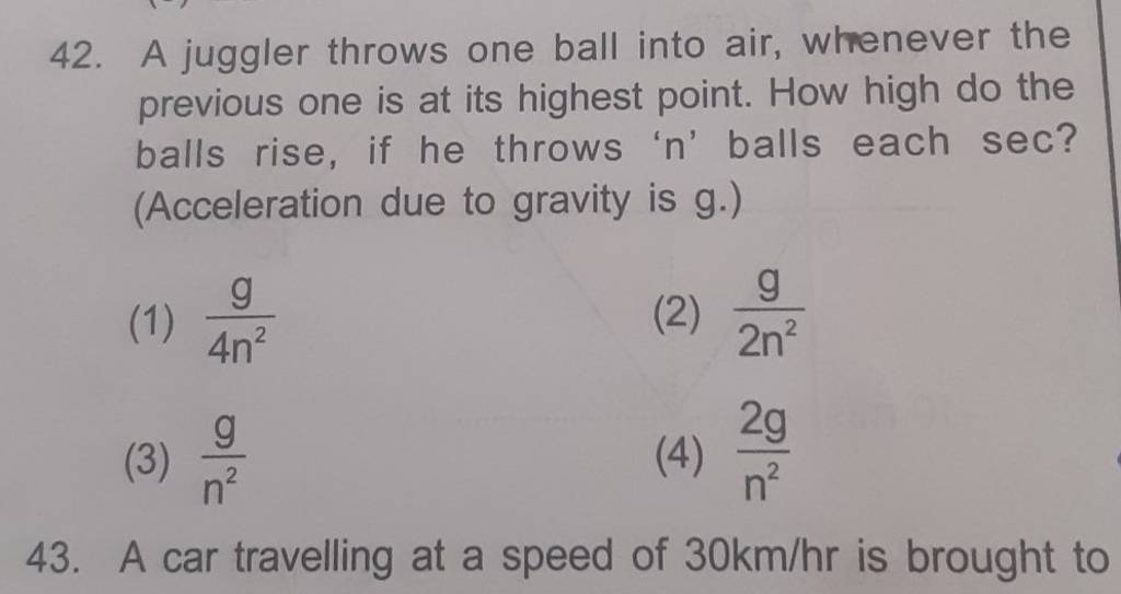A juggler throws one ball into air, whrenever the previous one is at its