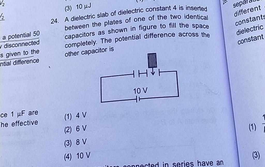 A Dielectric Slab Of Dielectric Constant 4 Is Inserted Between The Plates