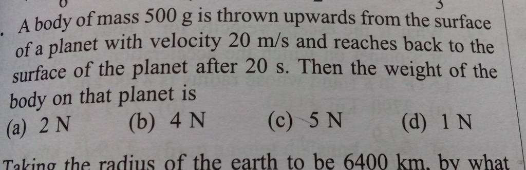 A body of mass 500 g is thrown upwards from the surface of a planet with