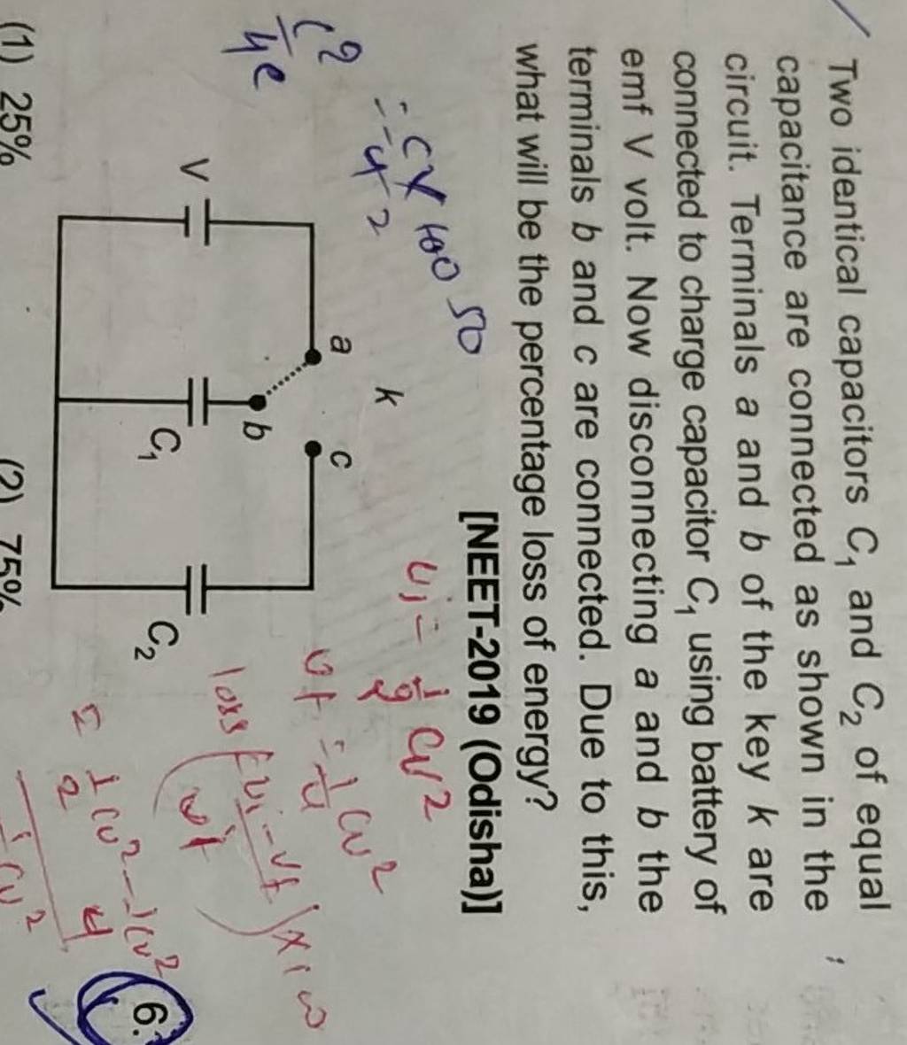 Two Identical Capacitors C1 And C2 Of Equal Capacitance Are Connected A..