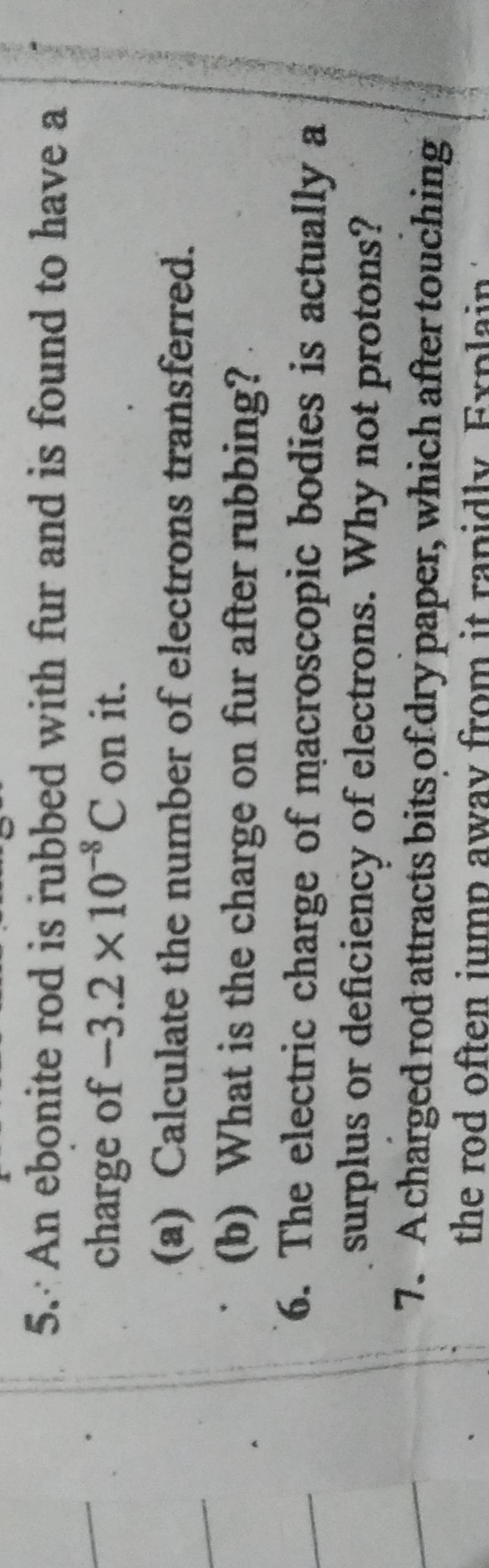 5. An ebonite rod is rubbed with fur and is found to have a charge of −3...