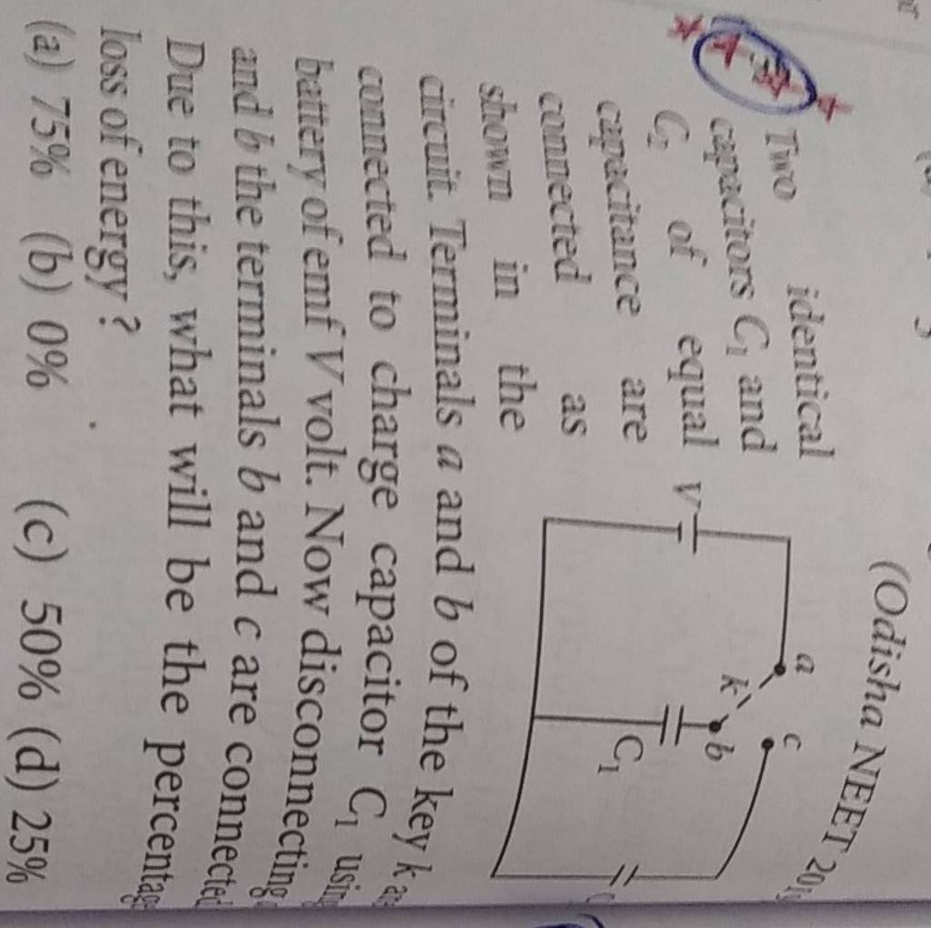 OOdisha NEET (5) Iro identical capacitors C1 and capacitance are connect..