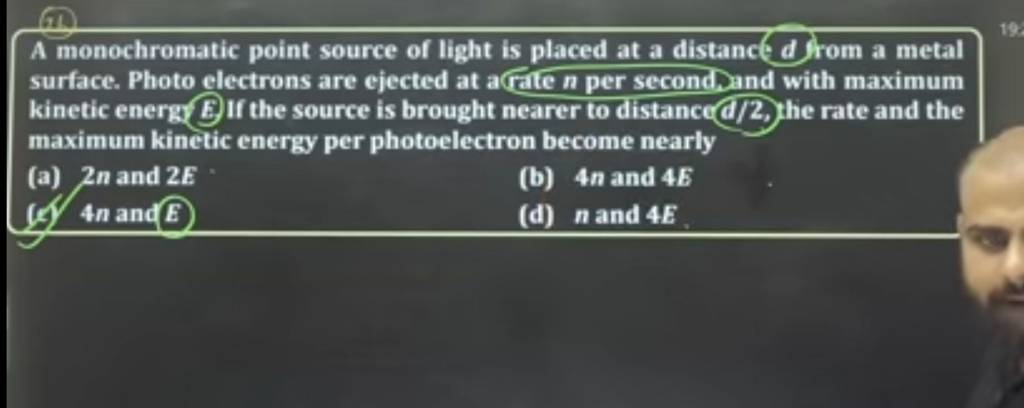 a monochromatic point source of light is placed