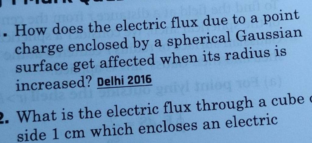How does the electric flux due to a point charge enclosed by a spheric