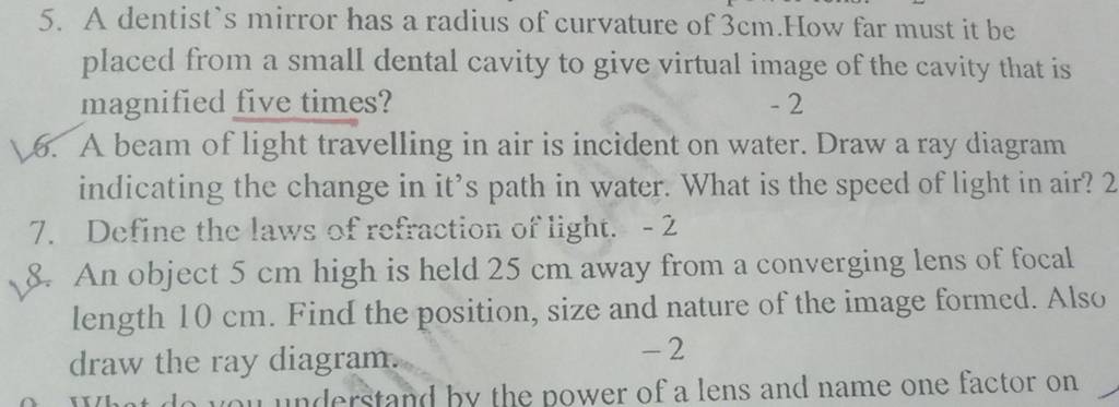 5. A dentist's mirror has a radius of curvature of 3 cm. How far must 