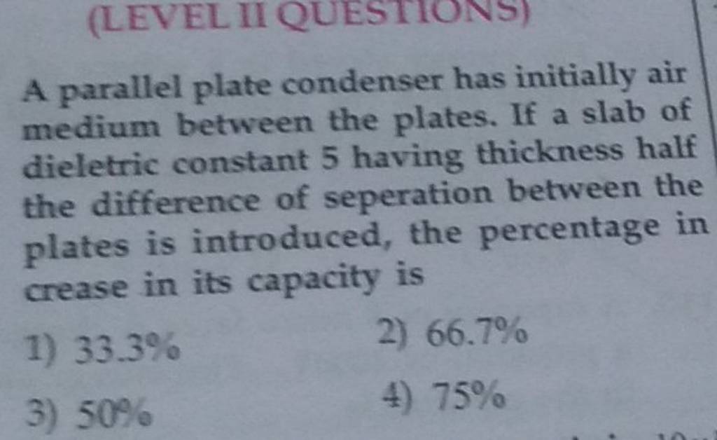 A parallel plate condenser has initially air medium between the plates. I..
