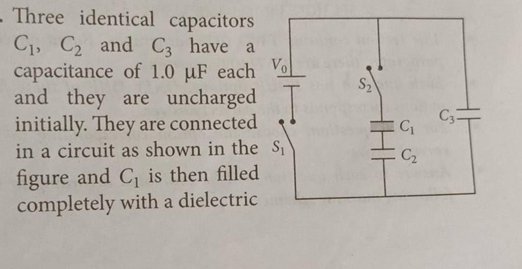 Three identical capacitors C1 ,C2 and C3 have a capacitance of 1.0μF ea..