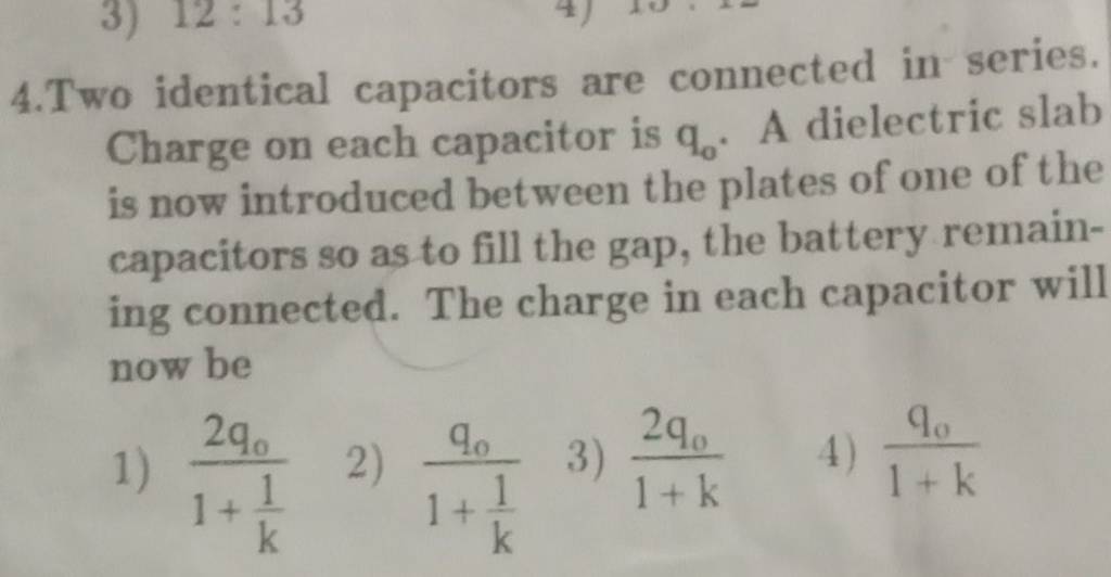 4.Two identical capacitors are connected in series. Charge on each capaci..