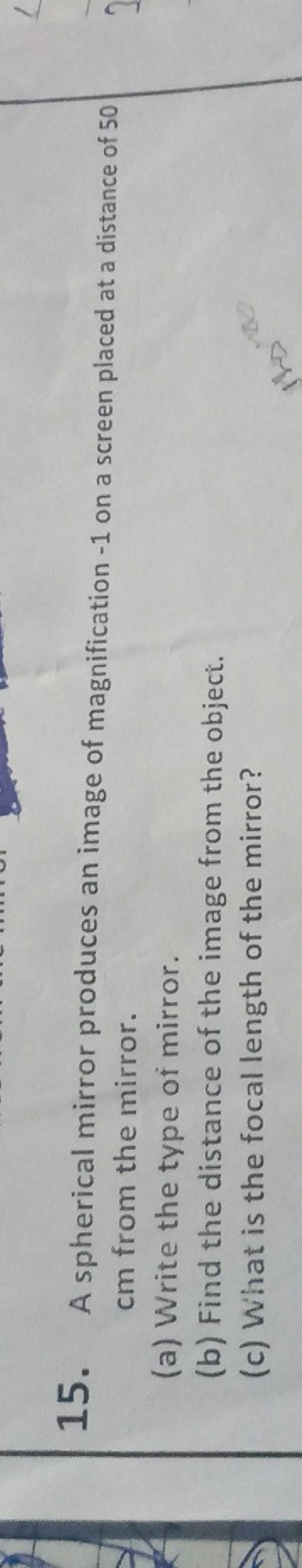 15. A spherical mirror produces an image of magnification −1 on a screen