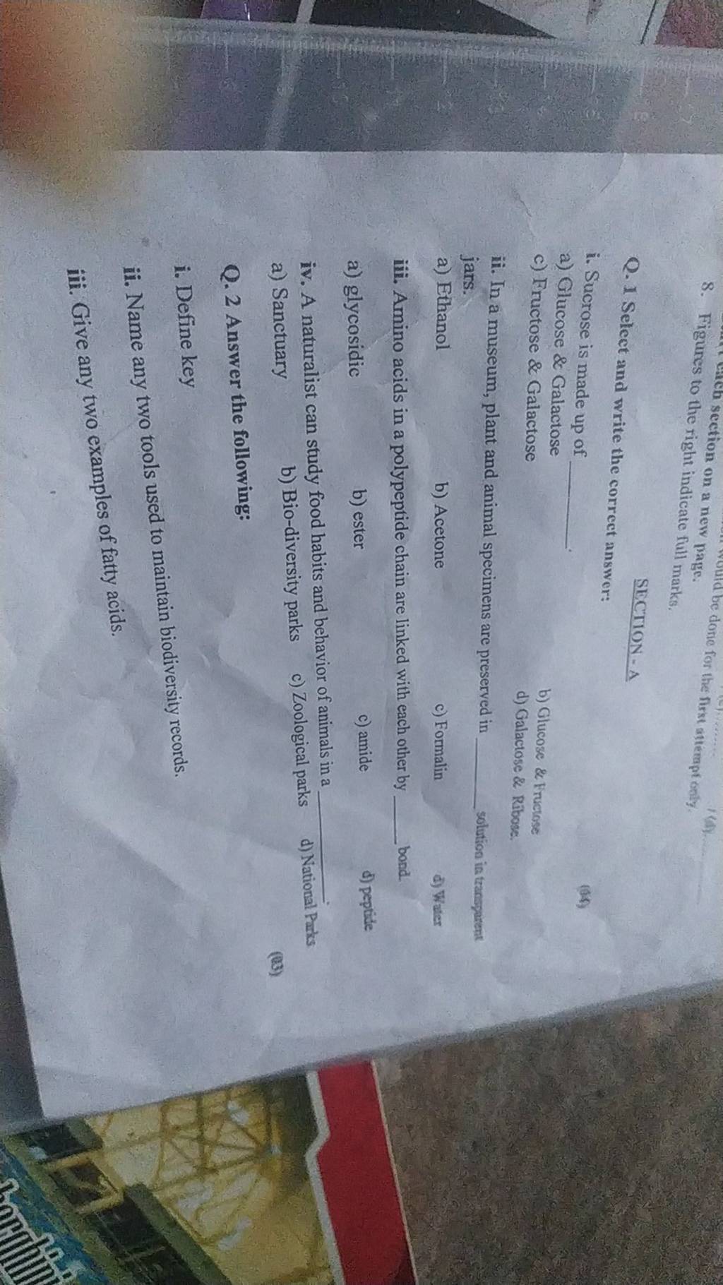 In a museum, plant and animal specimens are preserved in solution ia tran..