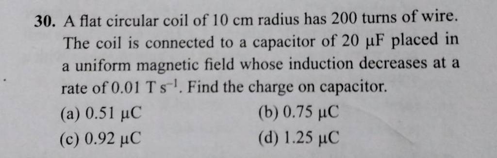 A Flat Circular Coil Of 10 Cm Radius Has 200 Turns Of Wire The Coil Is C