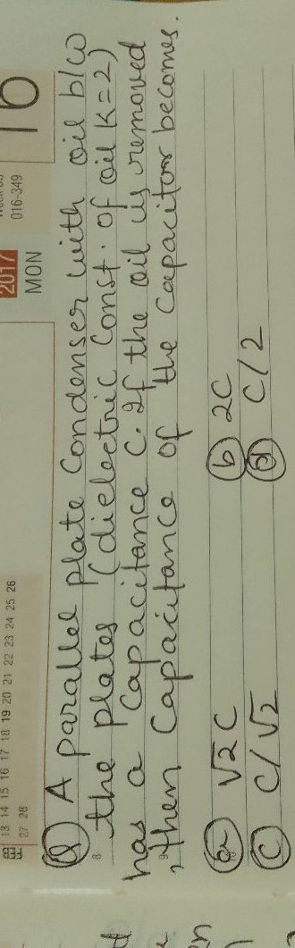 A parallel plate Condenser with oil b/w the plates (dielectric Const of