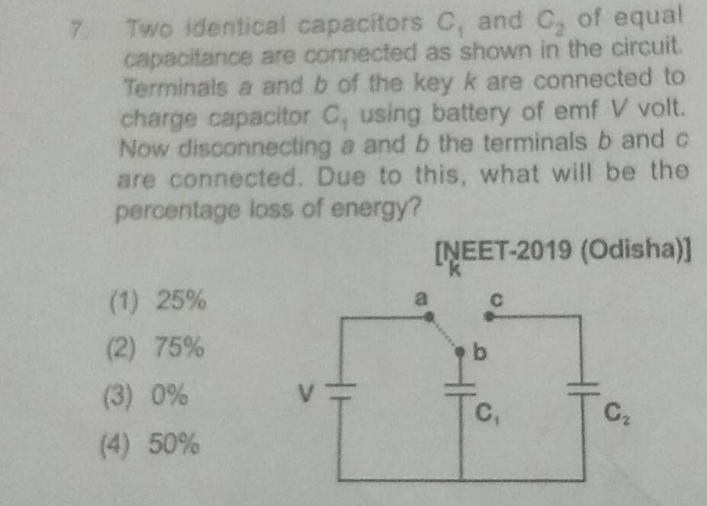 Two identical capacitors C1 and C2 of equal capacitance are connected a..