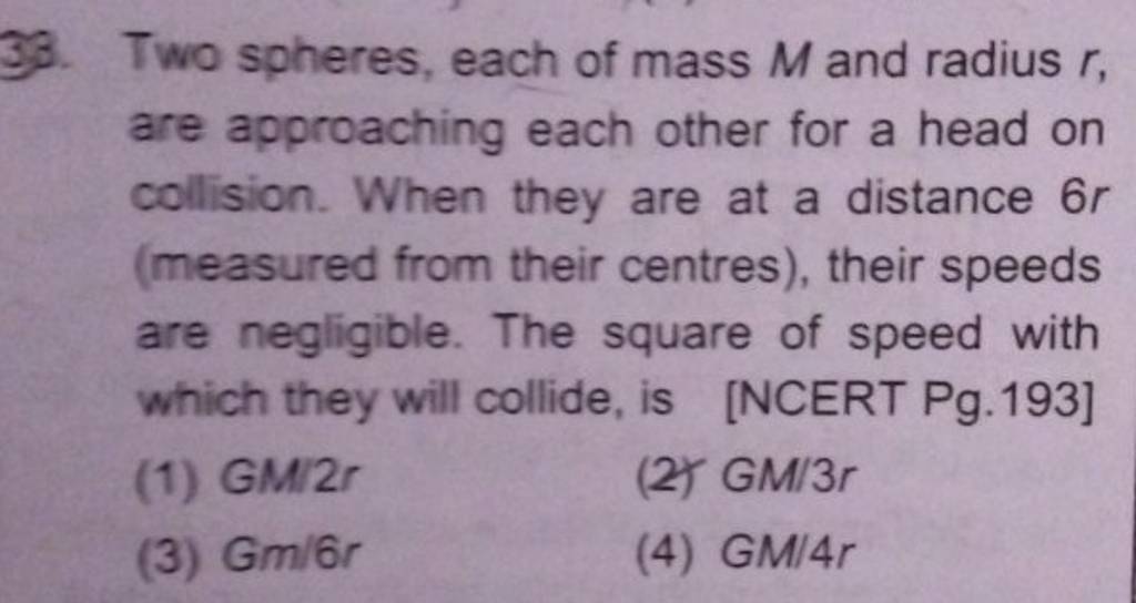 Two spheres, each of mass M and radius r, are approaching each other for
