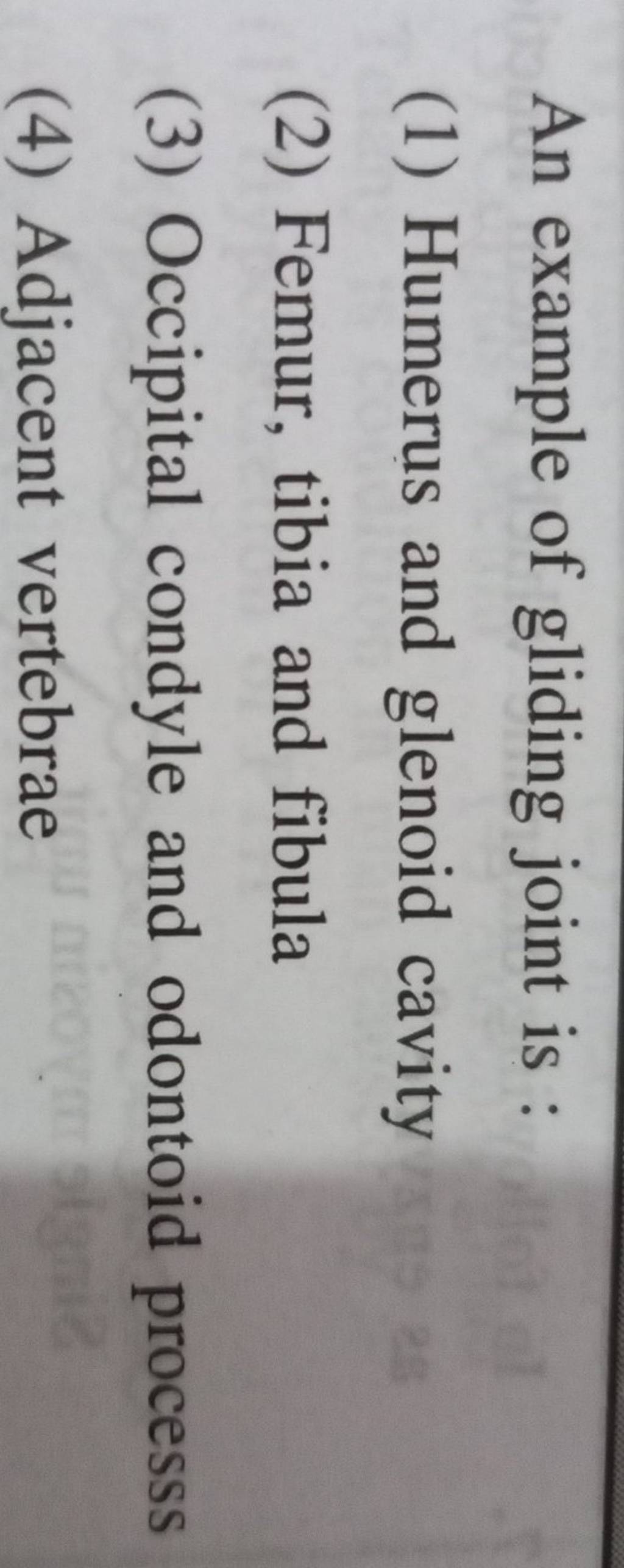 An example of gliding joint is Filo