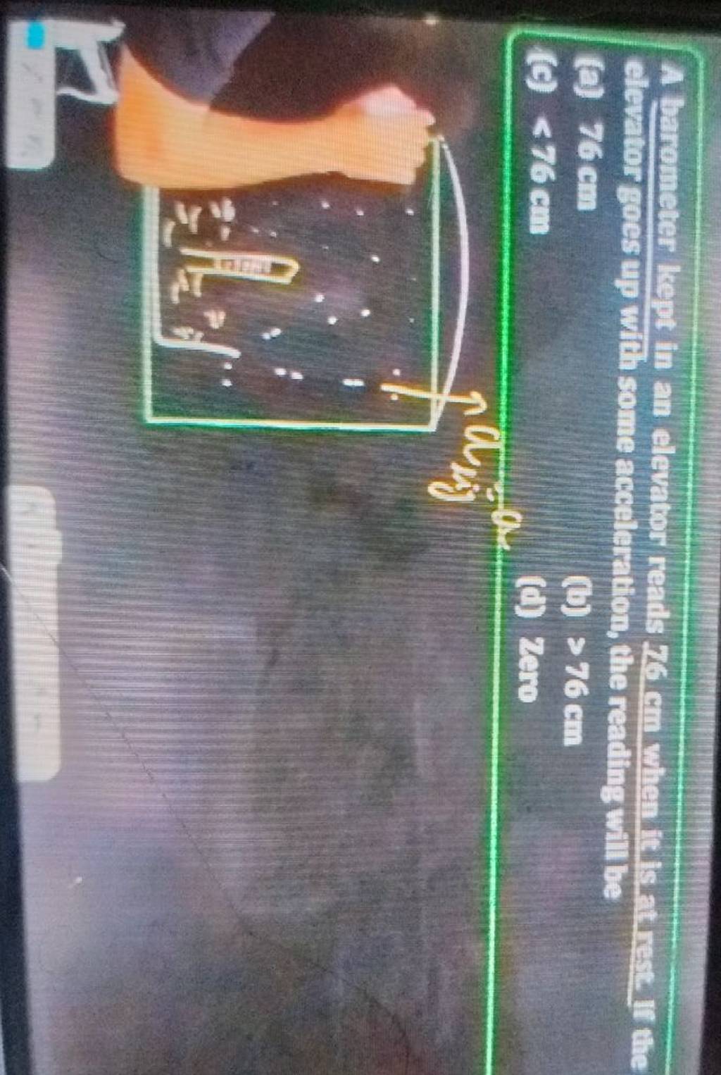 A barometer kept in an elevator reads 76 cm when it is at rest. If the el..