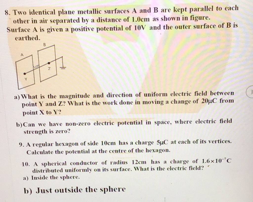 8. Two identical plane metallic surfaces A and B are kept parallel to eac..