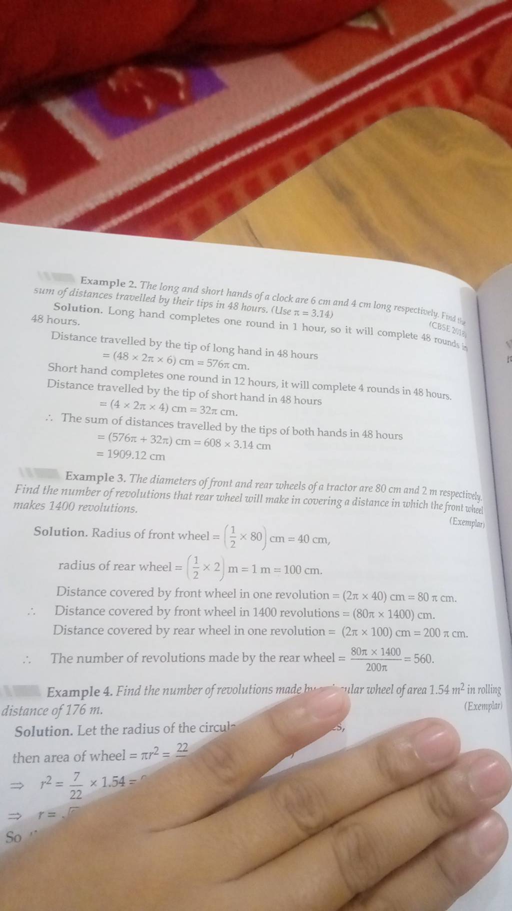 Example 2. The long and short hands of a clock are 6 cm and 4 cm long res..