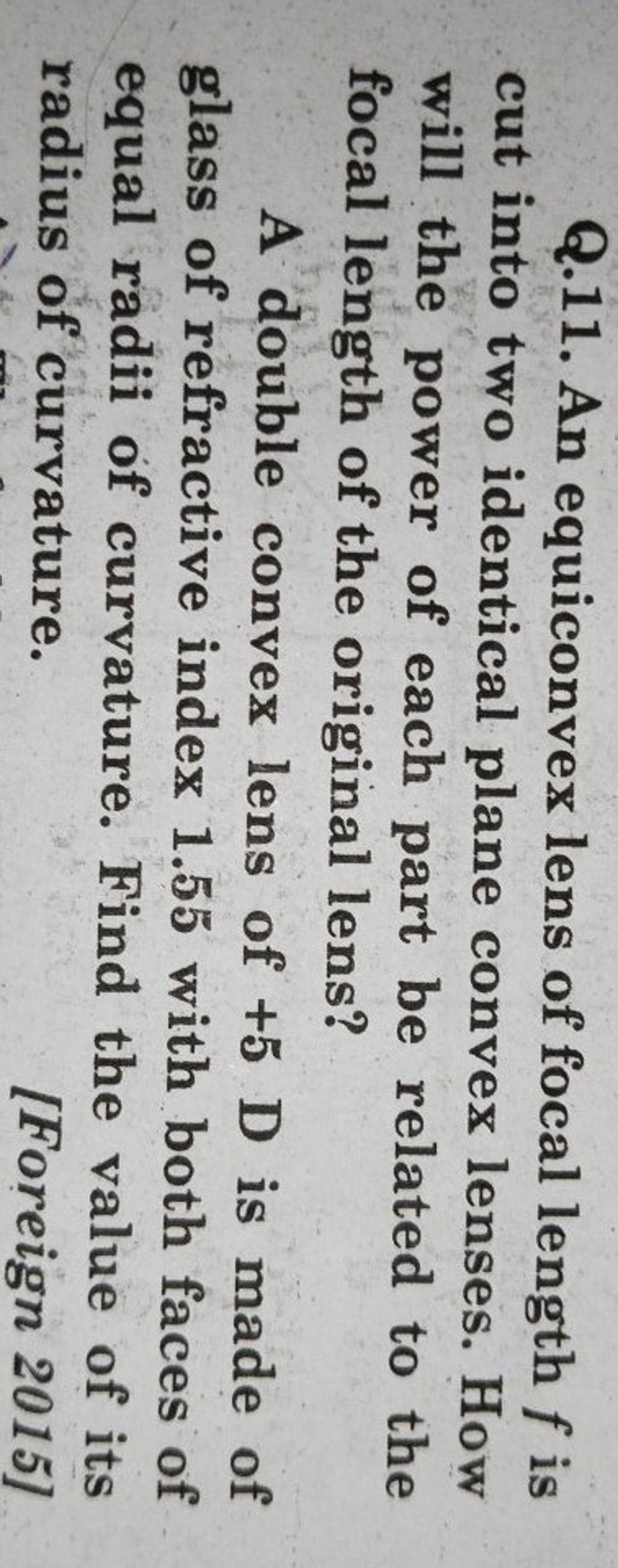 Q.11. An equiconvex lens of focal length f is cut into two identical plan..