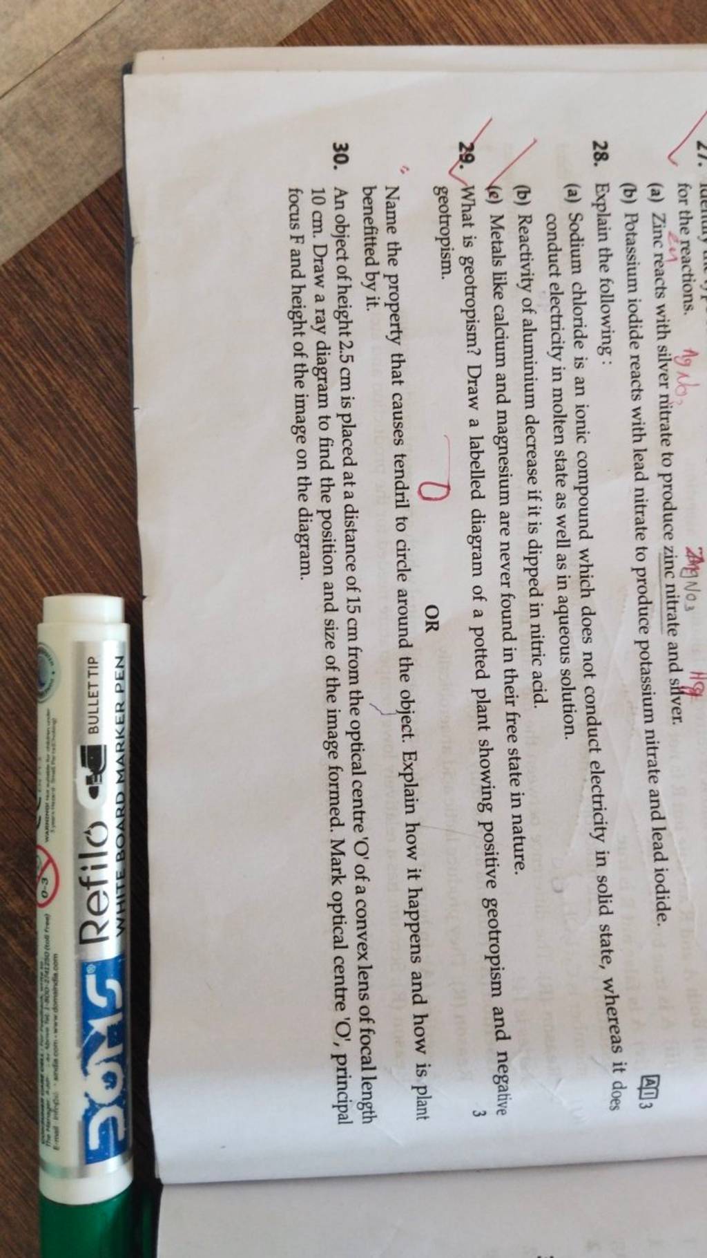 (a) Zinc reacts with silver nitrate to produce zinc nitrate and silver. 2..