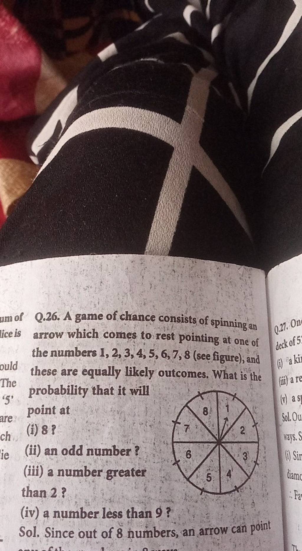 Q.26. A game of chance consists of spinning an arrow which comes to rest