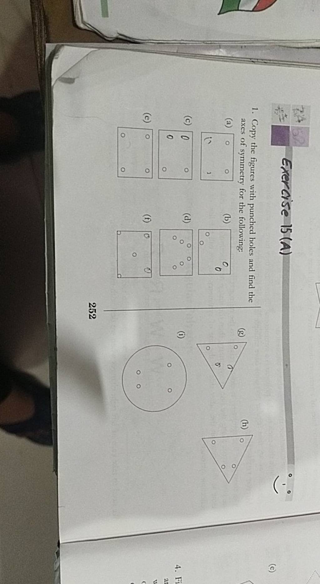 1. Copy the figures with punched holes and find the axes of symmetry for