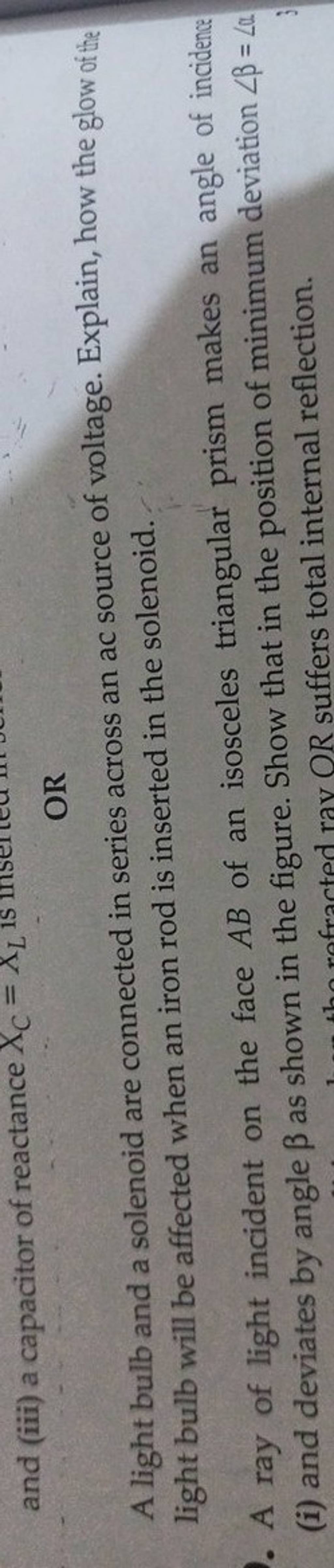 OR A light bulb and a solenoid are connected in series across an ac sourc..