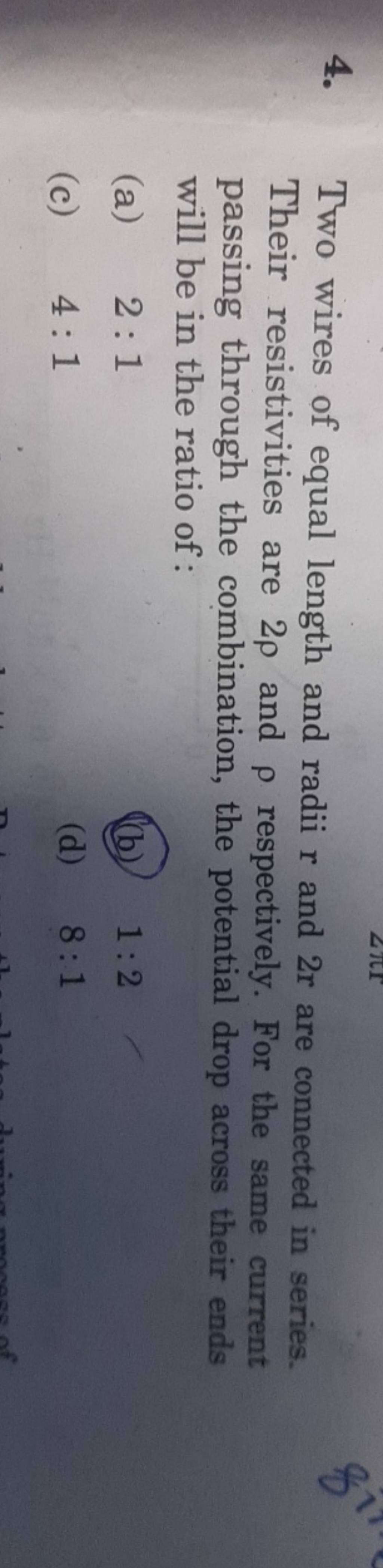 Two wires of equal length and radii r and 2r are connected in series. The..