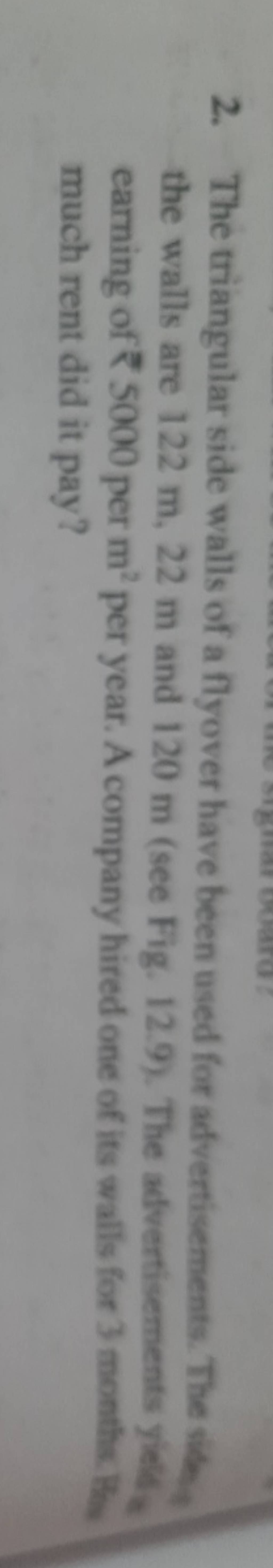 2. The triangular side walls of a flyover have been used for advertisemen..