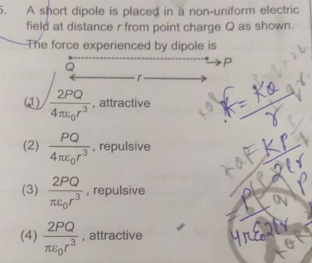 A short dipole is placed in a non-uniform electric field at distance r fr..