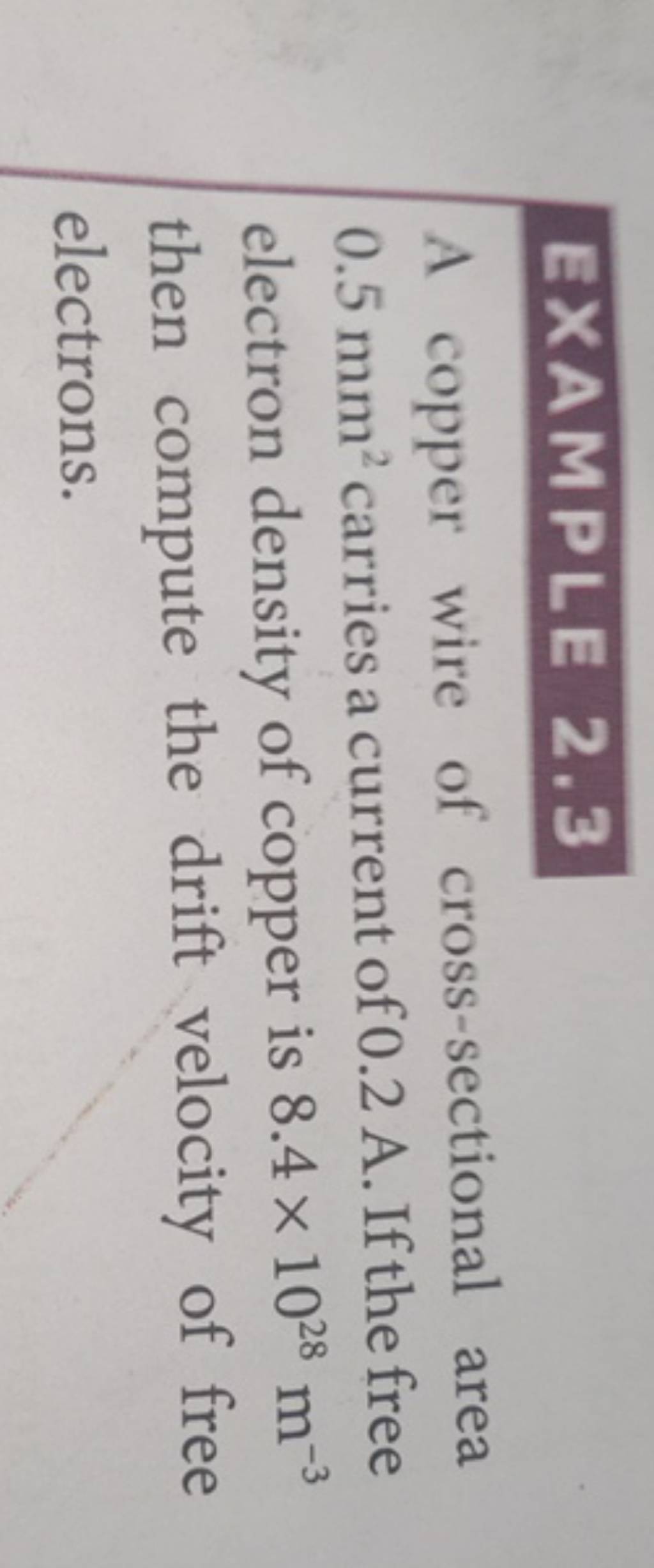 EXAMPLE 2.3 A copper wire of crosssectional area 0.5 mm2 carries a curre..