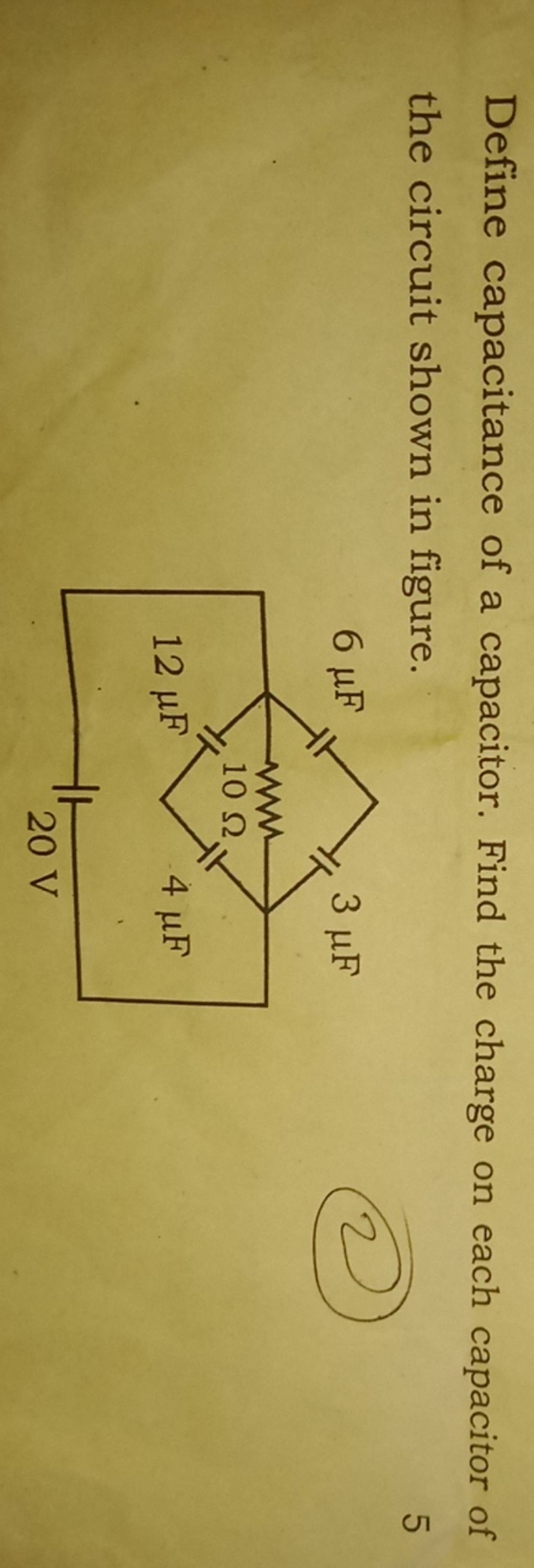 Define capacitance of a capacitor. Find the charge on each capacitor of t..