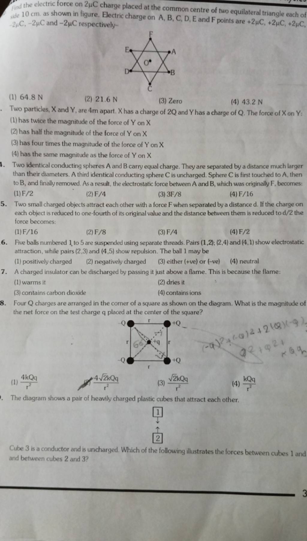 Two Identical Conducting Spheres A And B Carry Equal Charge. They Are Sep..