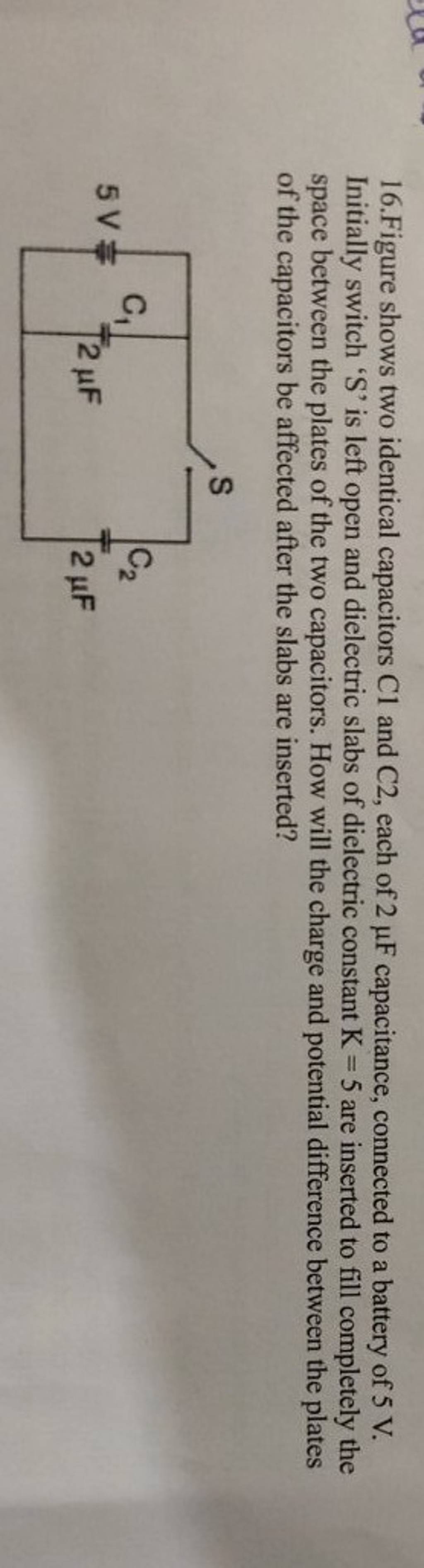 16. Figure shows two identical capacitors \mathrm{C} 1 and \mathrm{C} 2, each of 2 \mu \mathrm{F