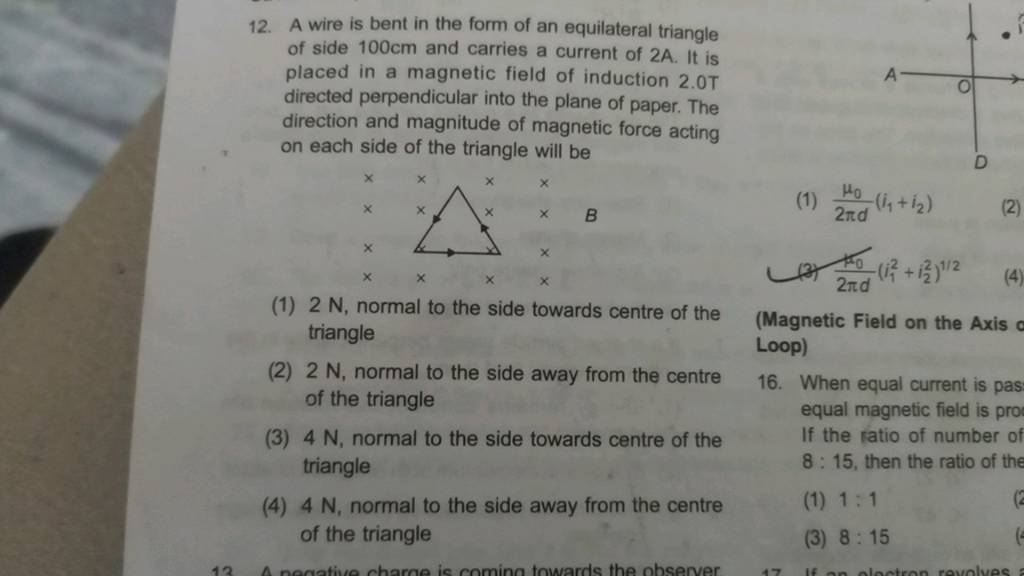 12. A wire is bent in the form of an equilateral triangle of side 100 cm